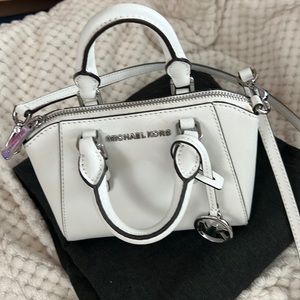 Michael Koes Small crossbody bag. Very cute/trendy. Barely used/clean interior.